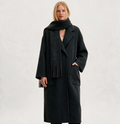 Woman wearing a Finlaine charcoal grey wool and cashmere long coat, front view